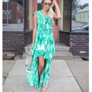 Vici collection tropical palm leaf high low dress.